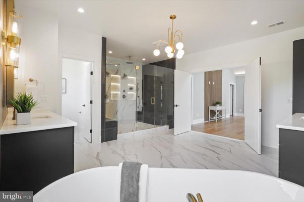 Bathroom, Free Standing Baths, Glass Shower, Interior, Marble, Marble Walls, Pendant Lights, Recessed Lighting