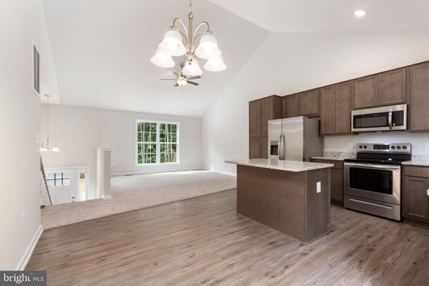 Chandelier, Interior, Kitchen, Pendant Lights, Recessed Lighting, Stainless Steel Appliances, Wood Texture Flooring