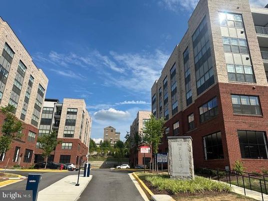 Exterior, Facade, Brick Facade, Condo Building