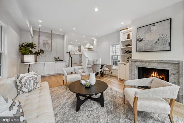 Dining room, Fireplace, Interior, Living room, Pendant Lights, Recessed Lighting, Wood Texture Flooring