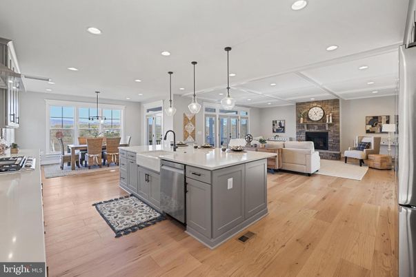 Dining room, Fireplace, Interior, Kitchen, Living room, Pendant Lights, Recessed Lighting, Stainless Steel Appliances, Wood Texture Flooring