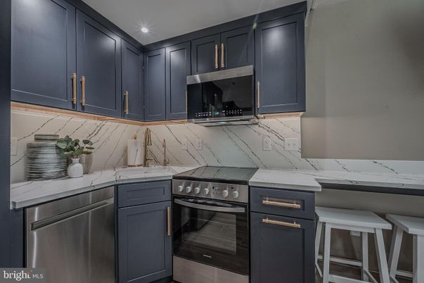 Interior, Kitchen, Marble Walls, Stainless Steel Appliances