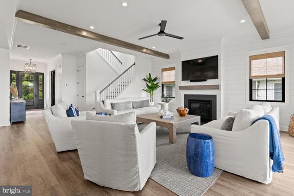 Fireplace, Interior, Living room, Pendant Lights, Recessed Lighting, Wooden Beams, Wood Texture Flooring