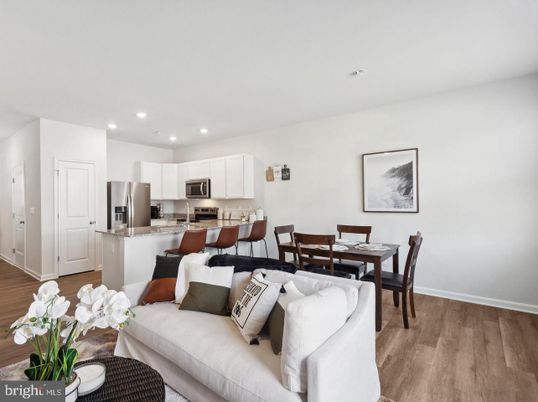 Dining room, Interior, Kitchen, Living room, Recessed Lighting, Stainless Steel Appliances, Wood Texture Flooring