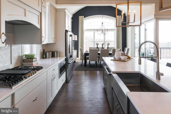 Chandelier, Dining room, Interior, Kitchen, Stainless Steel Appliances, Wood Texture Flooring