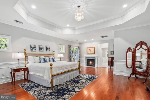 Bedroom, Chandelier, Fireplace, Interior, Recessed Lighting, Wood Texture Flooring