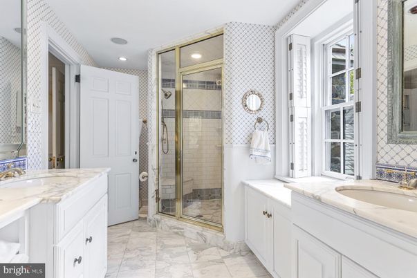 Bathroom, Dual Sink Vanities, Glass Shower, Interior, Marble, Recessed Lighting