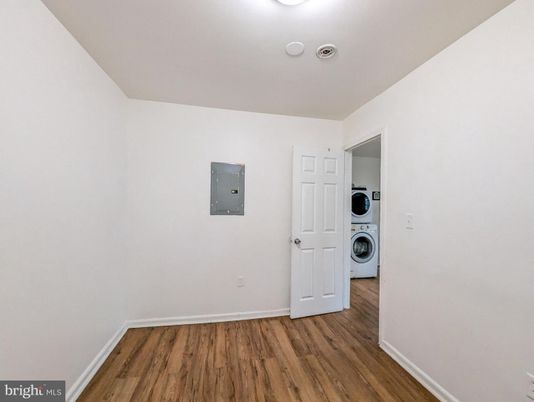 Empty room, Interior, Utility Closets, Washer, Wood Texture Flooring