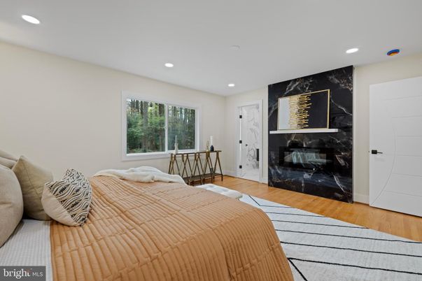 Bedroom, Fireplace, Interior, Recessed Lighting, Wood Texture Flooring