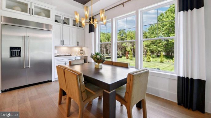 Chandelier, Dining room, Interior, Kitchen, Pendant Lights, Stainless Steel Appliances, Wood Texture Flooring