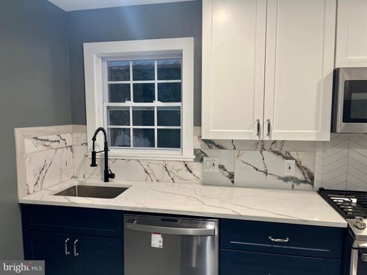 Interior, Kitchen, Marble Walls, Stainless Steel Appliances
