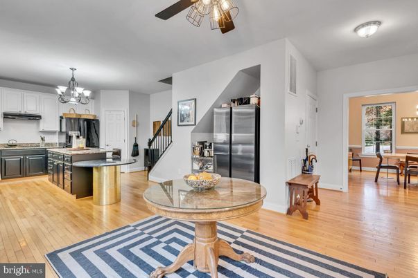 Chandelier, Dining room, Interior, Kitchen, Stainless Steel Appliances, Wood Texture Flooring