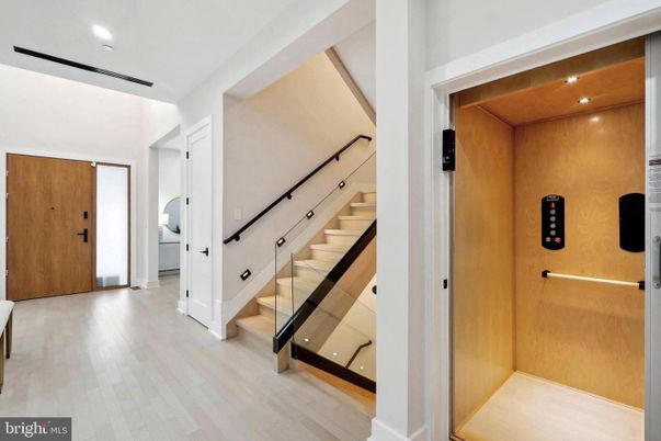 Elevator, Interior, Recessed Lighting, Wooden Ceilings, Wood Texture Flooring, Wooden Walls