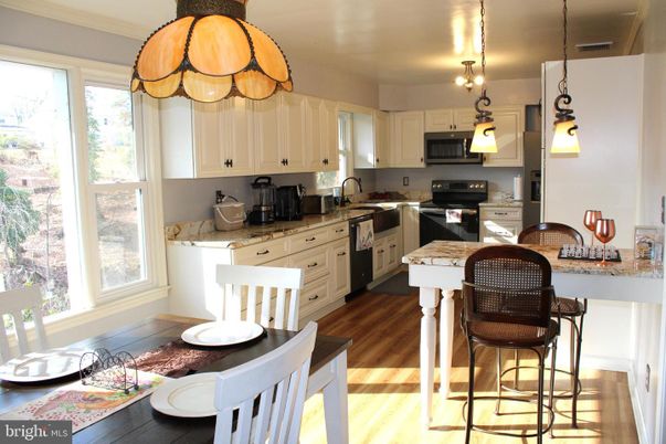 Interior, Kitchen, Pendant Lights, Stainless Steel Appliances, Wood Texture Flooring
