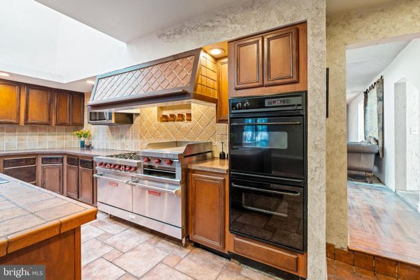 Interior, Kitchen, Recessed Lighting, Stainless Steel Appliances, Tile Countertops