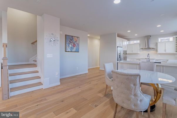 Dining room, Interior, Kitchen, Recessed Lighting, Stainless Steel Appliances, Wood Texture Flooring