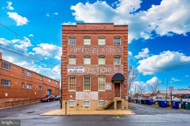 Exterior, Facade, Brick Facade, Condo Building