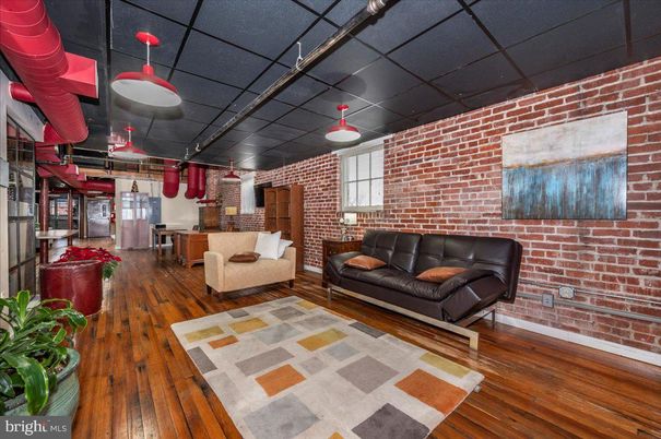 Interior, Kitchen, Pendant Lights, Stainless Steel Appliances, Stone Walls, Wood Texture Flooring