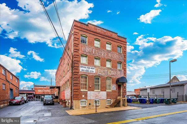 Exterior, Facade, Brick Facade, Condo Building