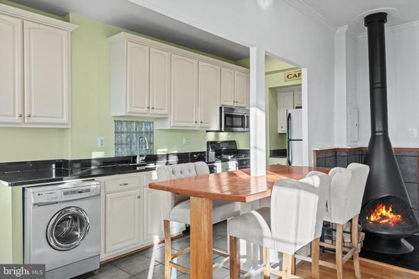Dining room, Fireplace, Interior, Kitchen, Washer