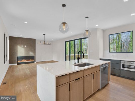 Fireplace, Interior, Kitchen, Pendant Lights, Recessed Lighting, Stainless Steel Appliances, Wood Texture Flooring