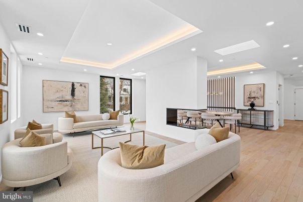 Dining room, Fireplace, Interior, Living room, Recessed Lighting, Wood Texture Flooring