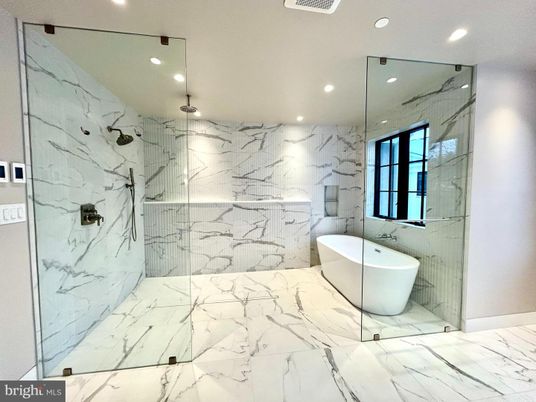 Bathroom, Free Standing Baths, Glass Shower, Interior, Marble, Marble Walls, Recessed Lighting