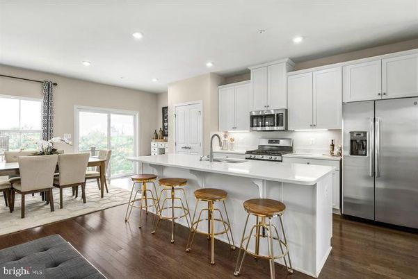 Dining room, Interior, Kitchen, Recessed Lighting, Stainless Steel Appliances, Wood Texture Flooring