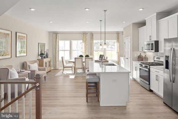 Dining room, Interior, Kitchen, Living room, Pendant Lights, Recessed Lighting, Stainless Steel Appliances, Wood Texture Flooring