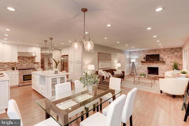 Dining room, Fireplace, Interior, Kitchen, Living room, Pendant Lights, Recessed Lighting, Stainless Steel Appliances, Stone Walls, Wood Texture Flooring