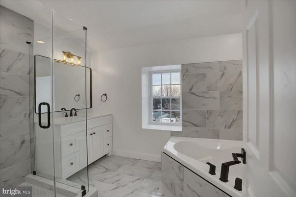 Bathroom, Dual Sink Vanities, Glass Shower, Interior, Marble, Marble Walls