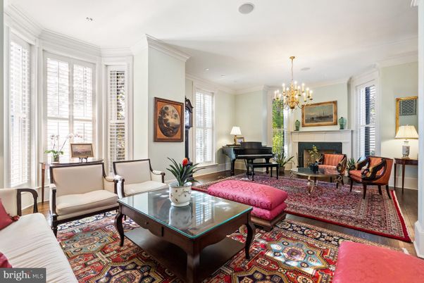 Chandelier, Fireplace, Interior, Living room, Piano, Recessed Lighting, Wood Texture Flooring