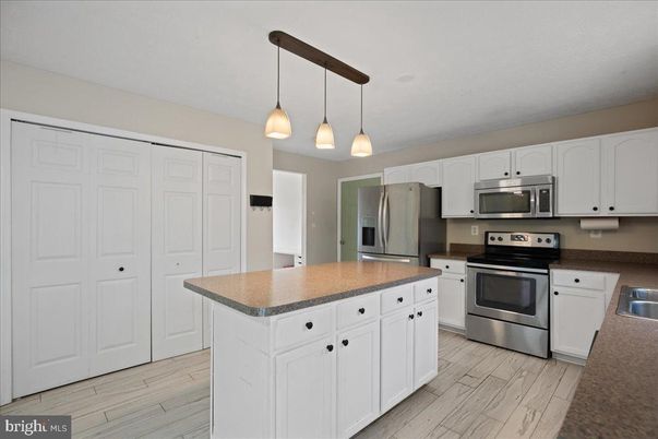 Interior, Kitchen, Pendant Lights, Stainless Steel Appliances, Wood Texture Flooring