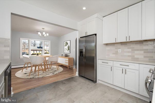 Chandelier, Dining room, Interior, Kitchen, Recessed Lighting, Stainless Steel Appliances, Wood Texture Flooring