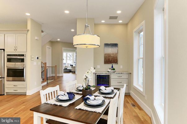 Dining room, Interior, Kitchen, Pendant Lights, Recessed Lighting, Stainless Steel Appliances, Wood Texture Flooring