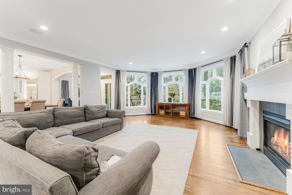 Chandelier, Fireplace, Interior, Living room, Recessed Lighting, Wood Texture Flooring