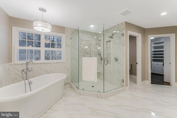 Bathroom, Free Standing Baths, Glass Shower, Interior, Marble, Marble Walls, Pendant Lights, Recessed Lighting