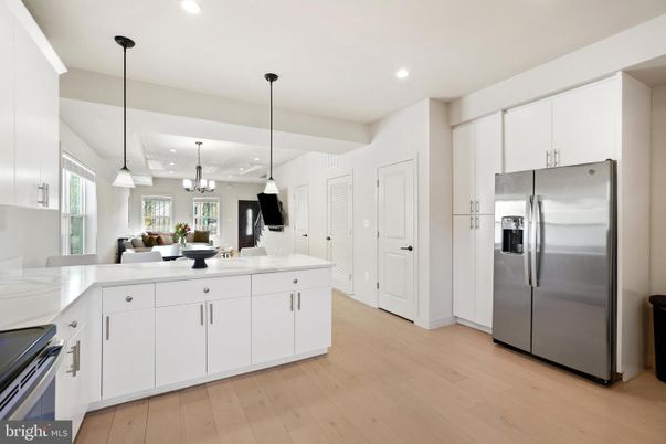 Dining room, Interior, Kitchen, Pendant Lights, Recessed Lighting, Stainless Steel Appliances, Wood Texture Flooring