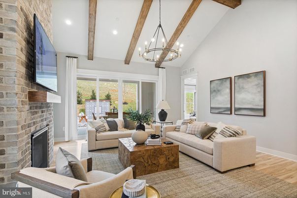 Chandelier, Fireplace, Interior, Living room, Recessed Lighting, Stone Walls, Wooden Beams, Wood Texture Flooring