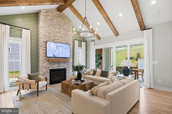 Fireplace, Interior, Living room, Pendant Lights, Recessed Lighting, Stone Walls, Wooden Beams, Wood Texture Flooring