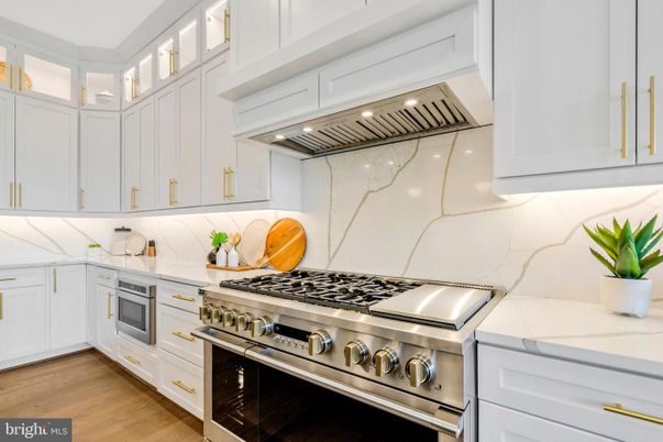 Interior, Kitchen, Marble Walls, Stainless Steel Appliances, Wood Texture Flooring