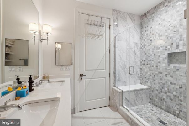 Bathroom, Dual Sink Vanities, Glass Shower, Interior, Marble Walls