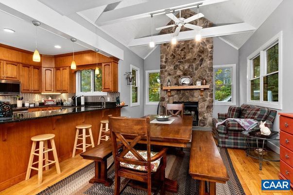 Dining room, Fireplace, Interior, Kitchen, Pendant Lights, Recessed Lighting, Stone Walls, Wood Texture Flooring