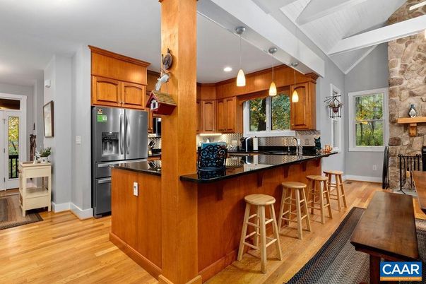 Interior, Kitchen, Pendant Lights, Recessed Lighting, Stainless Steel Appliances, Stone Walls, Wood Texture Flooring