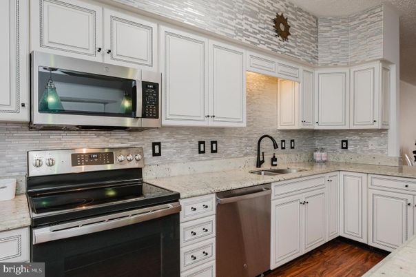 Interior, Kitchen, Stainless Steel Appliances, Stone Walls, Wood Texture Flooring