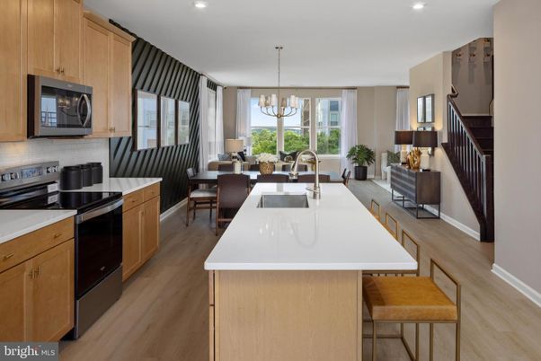 Chandelier, Dining room, Interior, Kitchen, Recessed Lighting, Stainless Steel Appliances, Wood Texture Flooring
