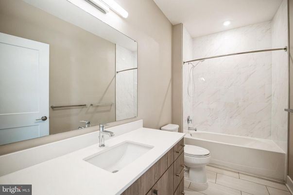 Bathroom, Dual Sink Vanities, Interior, Marble Walls, Recessed Lighting