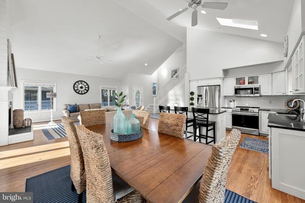 Dining room, Interior, Kitchen, Living room, Recessed Lighting, Stainless Steel Appliances, Wood Texture Flooring