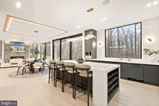 Dining room, Fireplace, Interior, Kitchen, Living room, Pendant Lights, Recessed Lighting, Stone Walls, Wood Texture Flooring
