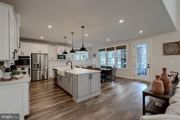 Dining room, Interior, Kitchen, Pendant Lights, Recessed Lighting, Stainless Steel Appliances, Wood Texture Flooring